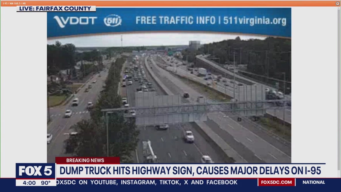 Dump truck driver hits I-95 overhead sign